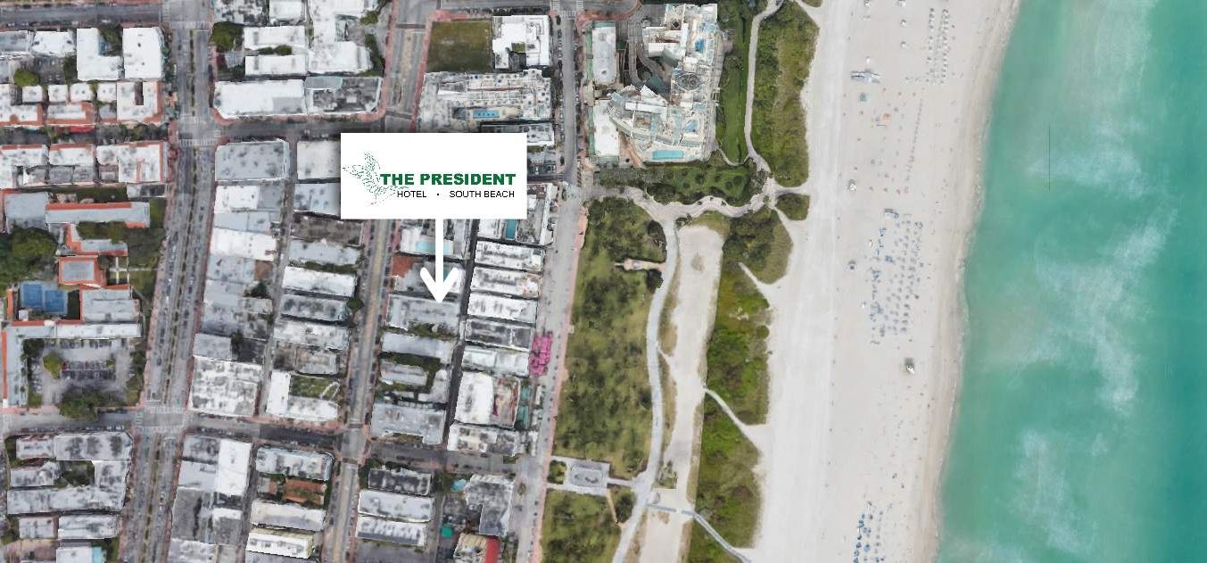 Aerial view of a coastal area showing buildings, streets, greenery, and a beach. An arrow points to "The President Hotel."